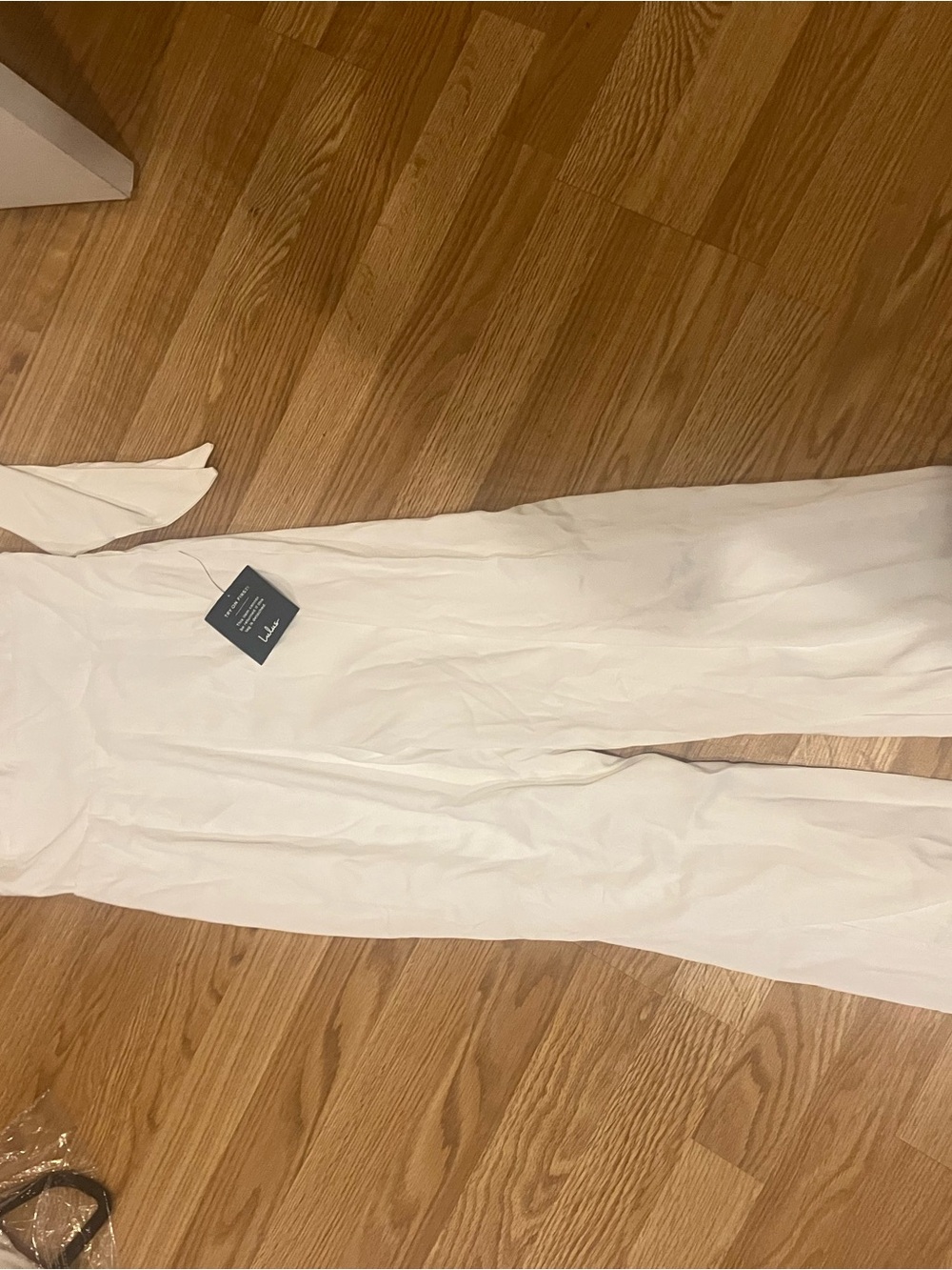 Lulu's white Sleeveless V-Neck Jumpsuit! With bow! - Picture 4 of 11